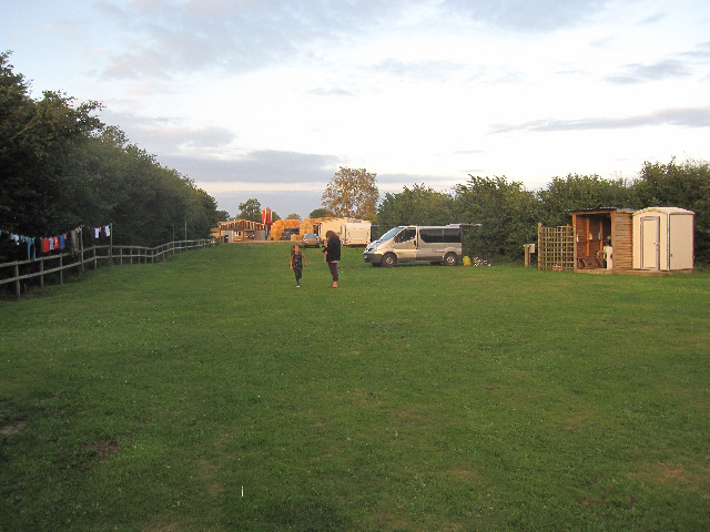 Parking space. In the background of the cowshed can be seen. The Farmhouse is located (not visible h ...