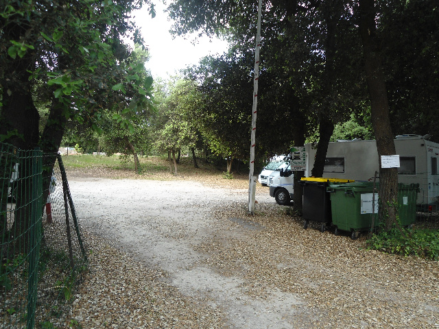  the entrance to the parking lot, left supply and disposal