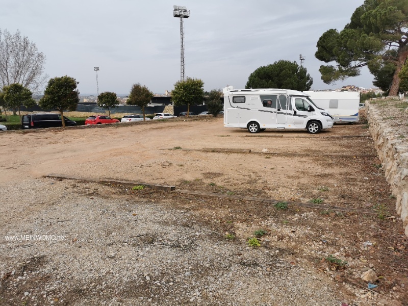 Pitch seen from the street, behind the caravan is the VE