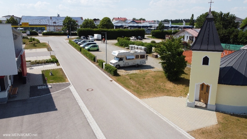 View over the parking spaces, in the background you can see the Netto market