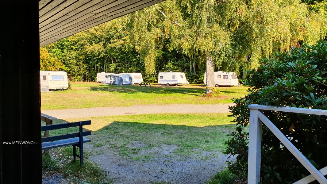   Pitches for caravans and tents in the rear area behind the sanitary building.    
