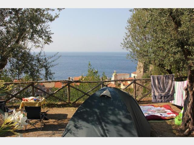  The campsite is situated on a slope above a small fishing village.