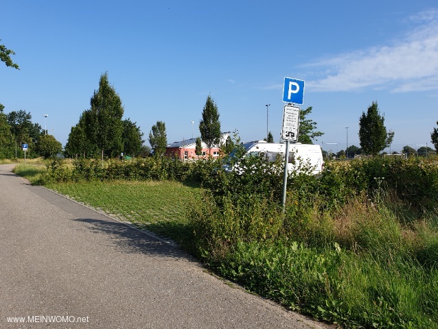  Parking space in front of the sports field   