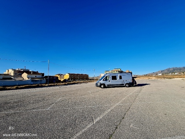 Large parking spaces on the edge of the village without restrictions