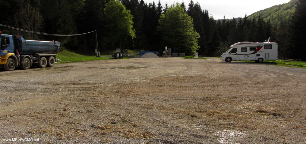  The pitch Mijoux in May 2015 - center back the supply / disposal site..  Parked equipment and a lar ...