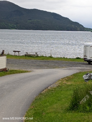 Campervan pitches down by the water 