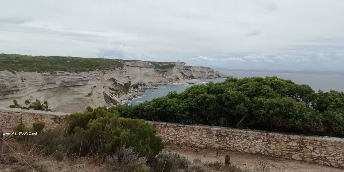   On the coastal hiking trail, view of Sardinia   