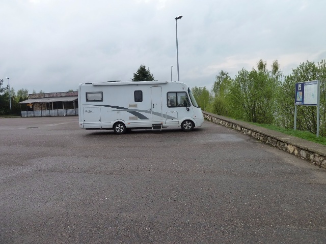  Large parking area in front of the small cafe at the Daugava river