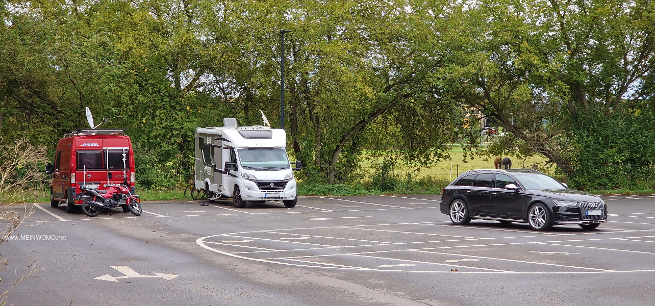 8 marked parking spaces 3x9m with satellite reception and power connection