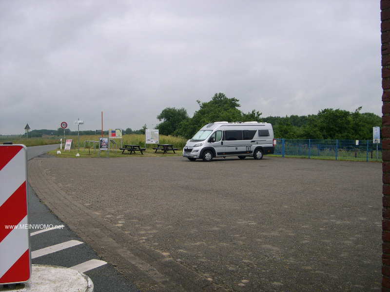  The parking space, information boards and seating area  
