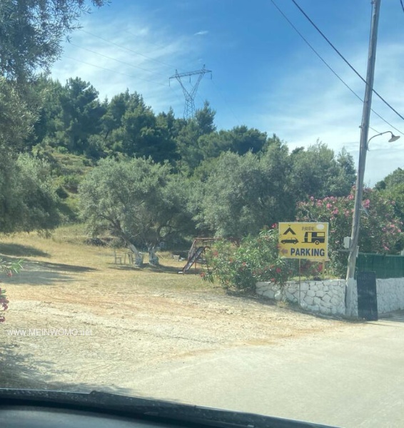 Entrance from the road to the square above Egremni Beach on Lefkada