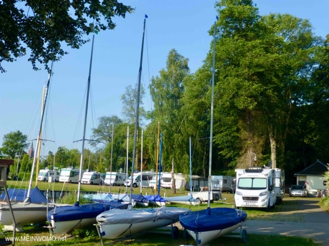 The picture shows the marina and parking space