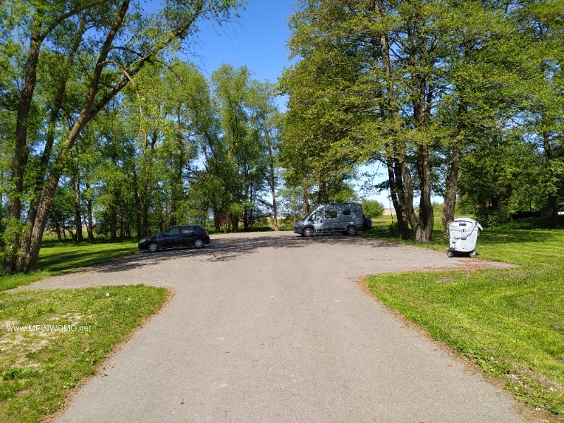 Parking lot with garbage can